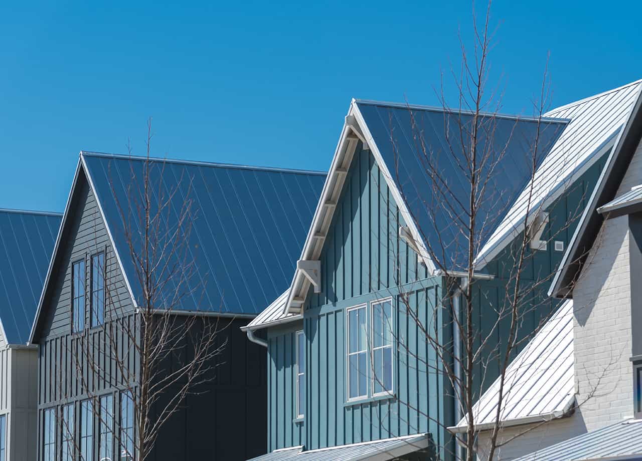 Close up image of the second story of homes with metal siding in Milford OH. Roofing For Troops are metal siding experts in the Milford OH & Cincinnati OH areas.
